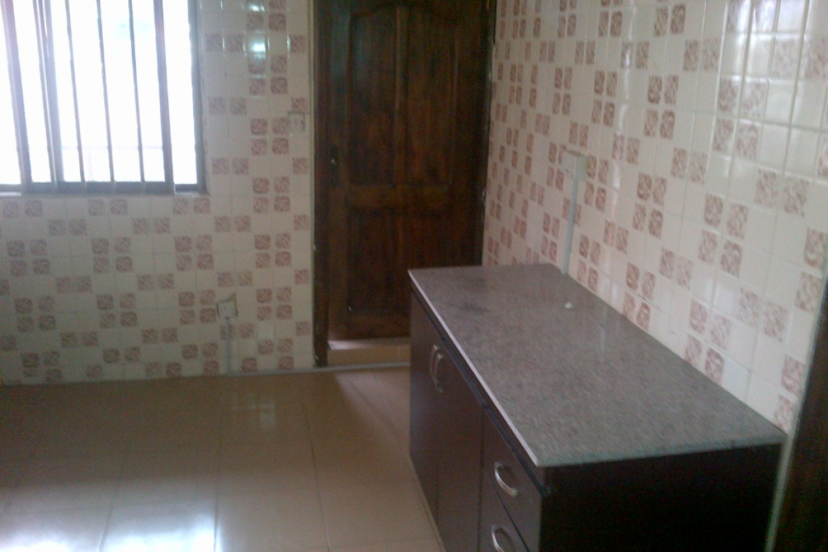 4. kitchen other side with balcony
