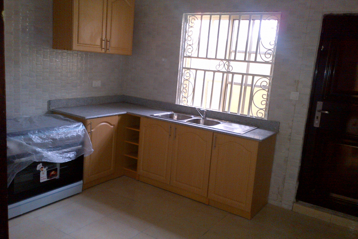 5. kitchen showing cooker and exit door