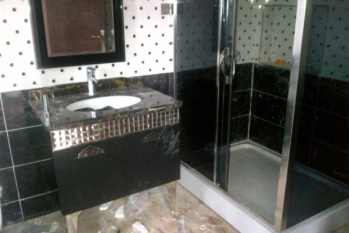17. washhand basin with shower cubicle