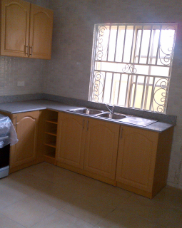 5. kitchen showing cooker and exit door