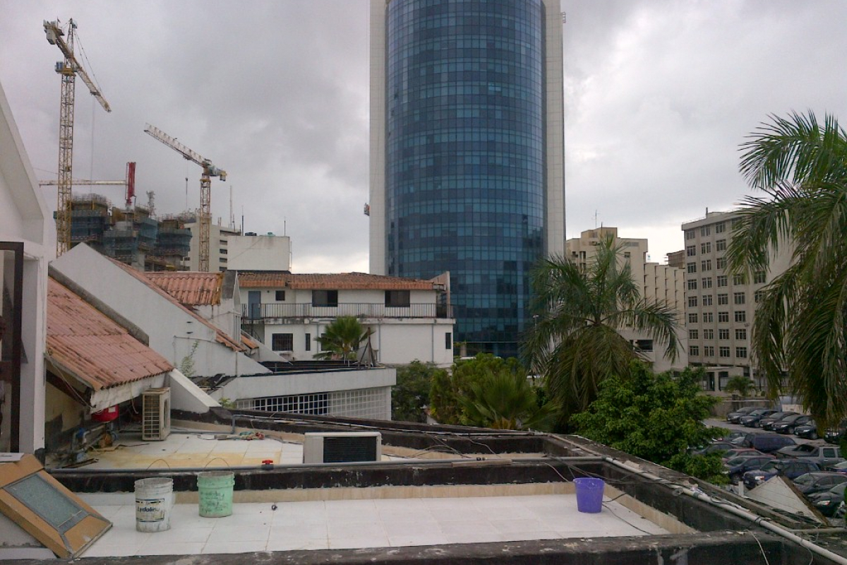 17. pent roof overlooking total building and eko hotel