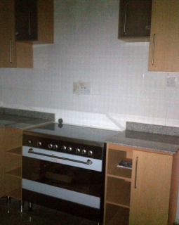 6. fitted kitchen side 1